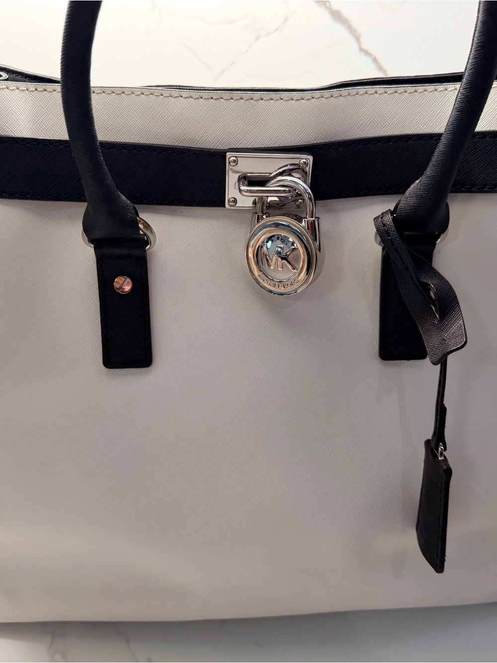 Michael Kors White and Black Saffiano Tote with Silver Padlock Charm